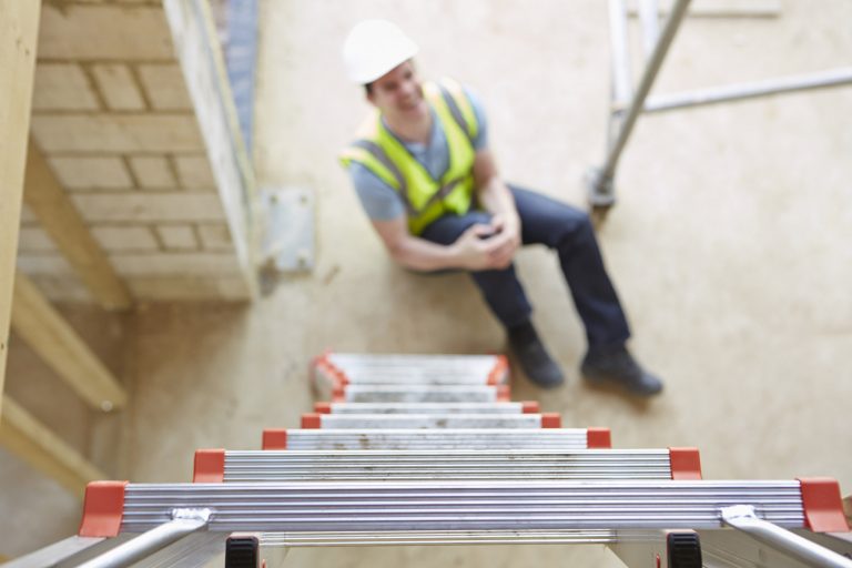 Construction Worker Falling Off Ladder And Injuring Leg Reading Personal Injury Solicitors